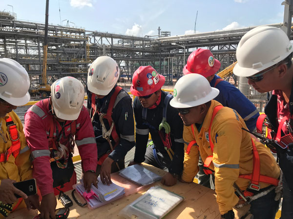 contractors discussing refractory materials